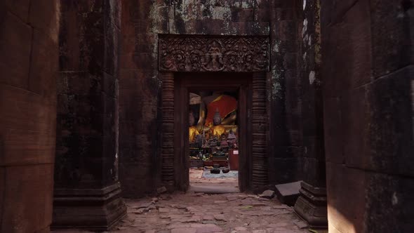 Vat Phou ruined Khmer Hindu Mountain Temple. Buddhism, Buddhist altar, buddha statues. Laos. Slow