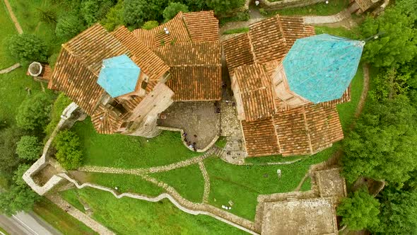 Drone flying over old Orthodox Gremi church in Georgia, sightseeing tourism alt