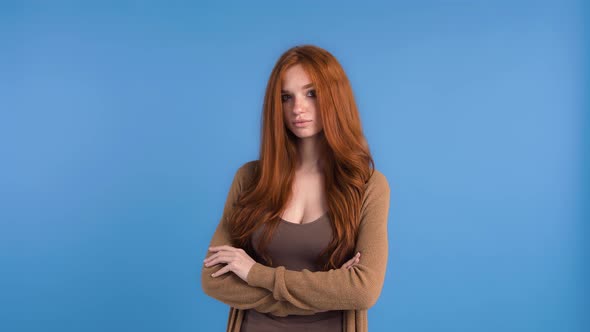 Ginger Woman in Brown Tshirt and Cardigan alt