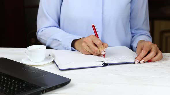 Female Hands Write To Do List on Blank Notepad, Drink Coffee alt