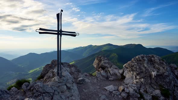 Christian Cross on the Top of Limestone Mountain Panoramic View of the Mountain Ridge