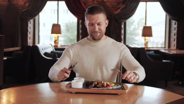 Restaurateur Try a New Dish From Chef in Stylish Grill Bar Slowmotion alt