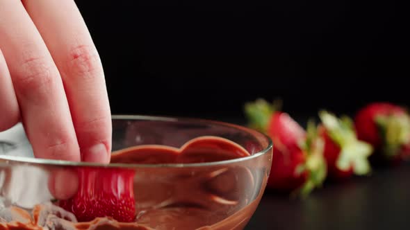 Strawberry in Melted Chocolate Closeup Melting Chocolate Bar for Fondue alt