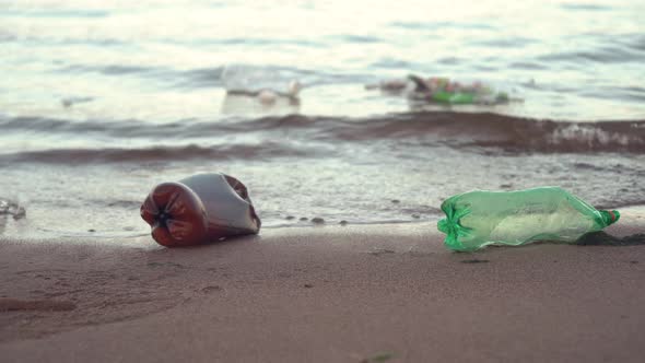 Plastic Garbage Lying on the Beach alt