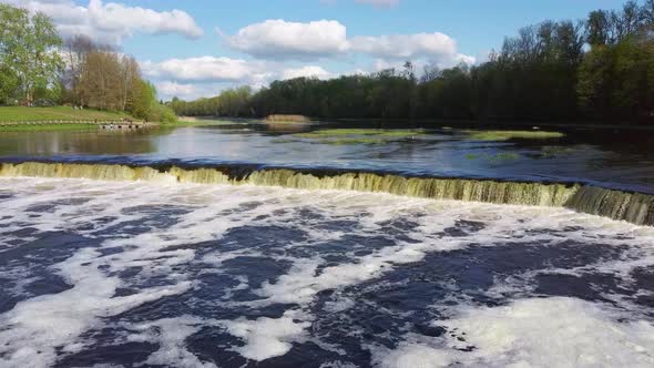 Flying Fish at Ventas Rumba The Widest Waterfall in Europe in Latvia Kuldiga, Aerial Dron Shot alt
