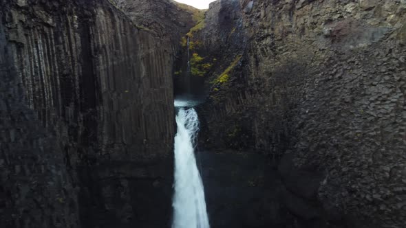 Spectacular Waterfall in the Middle of Basaltic Columns
