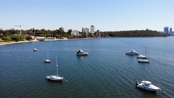 Aerial view of Boats by the City in Australia	