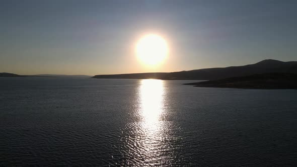 Sunset and Boat on the Sea alt