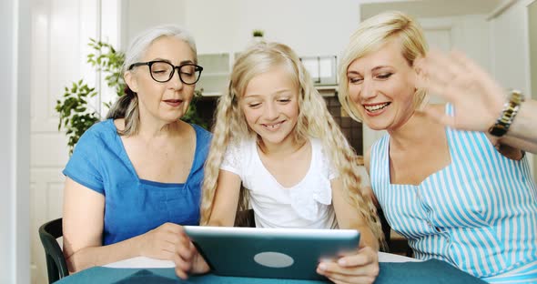 Family Having Video Chat on Tablet