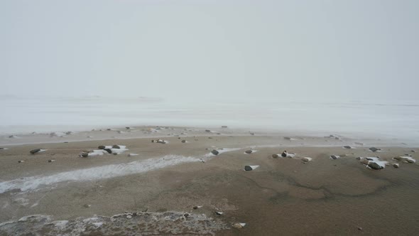 Snow blizzard on the seashore
