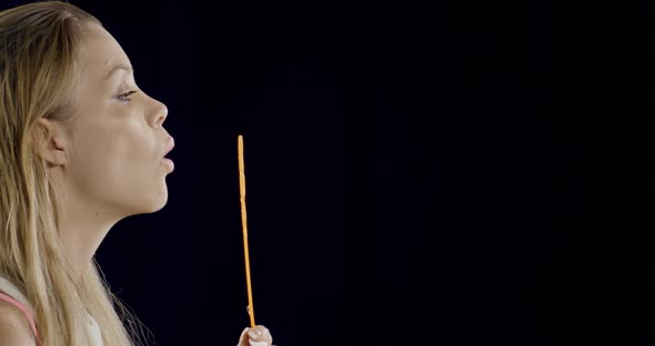 Pretty Woman Blowing Bubbles alt