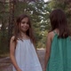 Two Beautiful Girls Walking in the Woods - VideoHive Item for Sale