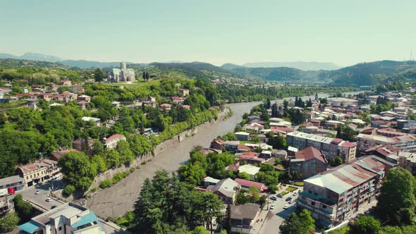 Scenic Drone Shot of River Rioni and Bagrati Cathedral in Kutaisi Georgia Europe alt