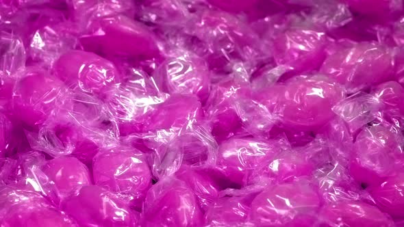 Pink Candies In Wrappers Rotating, Stock Footage | VideoHive