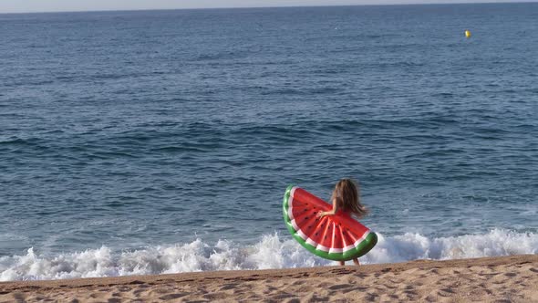 Aerial View of Slim Woman in Bikini Running To Sea alt
