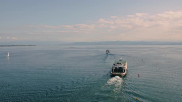 Boat And Ferry Sailing On Lake alt