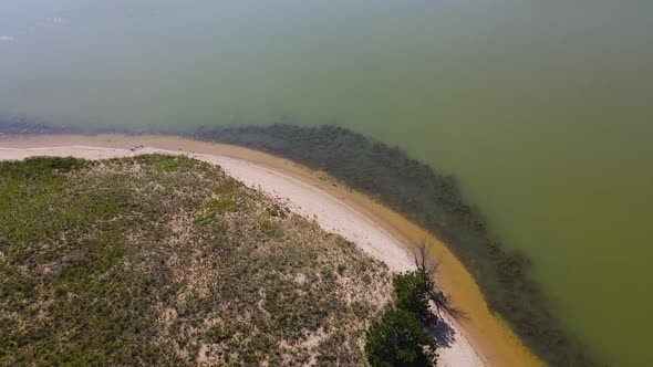 Descending and pushing forward over the water in a landing type action. alt