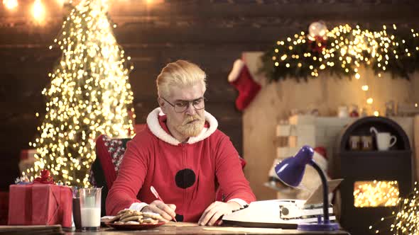 Wishlist for Funny Modern Santa. House for Santa. Dear Santa. SantaClaus in Wooden Home Interior alt