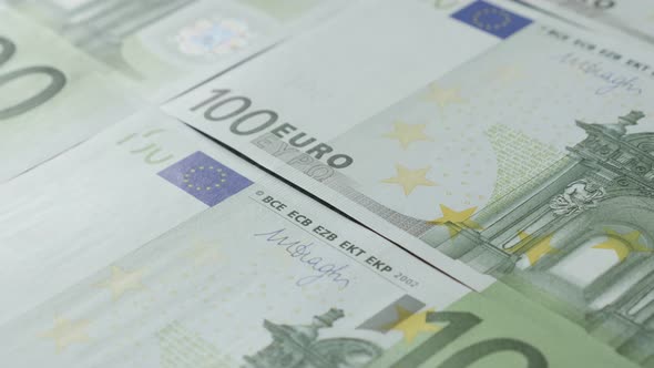 Hundreds and thousands of Euros on table slow tilt 4K 2160p 30fps UltraHD  footage - Paper banknotes alt