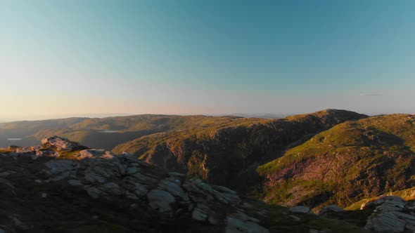 Beautiful mountains and landscape in the sunset - Aerial 4K alt