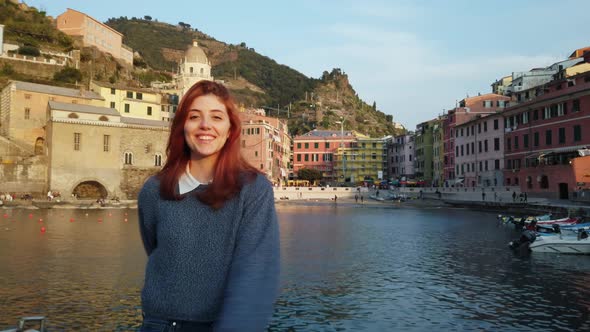 Young Girl Has Fun in Vernazza a City in the Cinque Terre in Italy alt