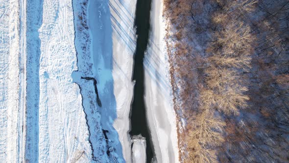 A river with snow-covered banks