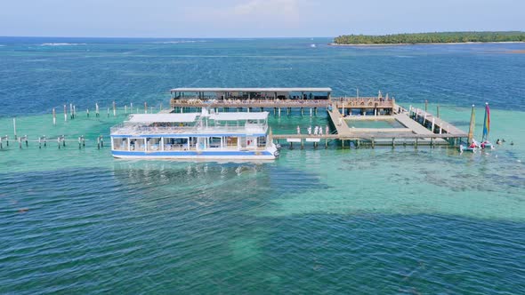 Tourists Walking On Boardwalk At The Ocean Adventure Park In Punta Cana, Dominican Republic. Summer alt