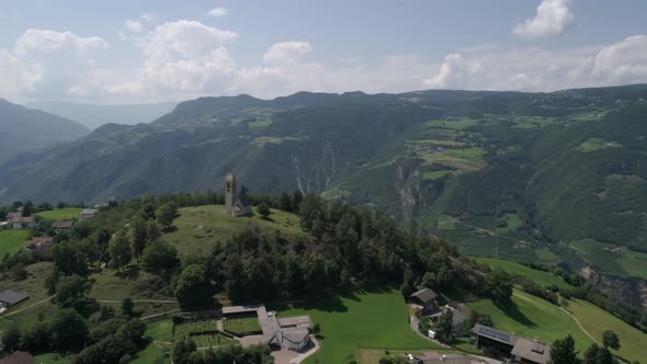 Aerial drone video of the city of Völs am Schlern Fie allo Sciliar  on the Italian Alps Dolomites alt