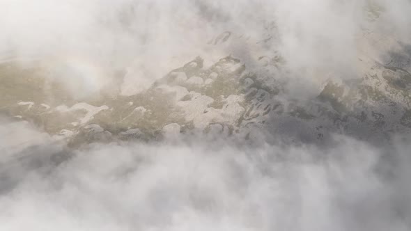Scenic aerial view of moving white clouds at Abuli Mountain. Georgia alt