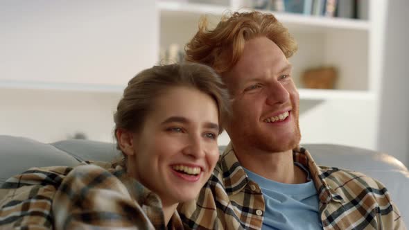 Happy Family Watch Comedy Movie Have Good Time in Living Room Together Closeup alt