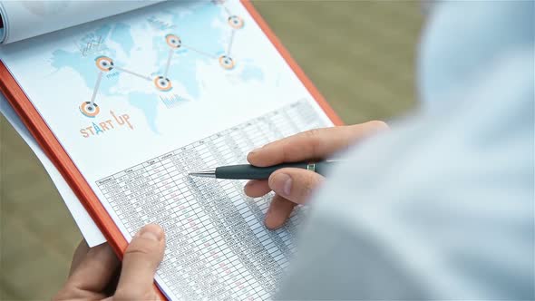 Businessman Working With Documents alt