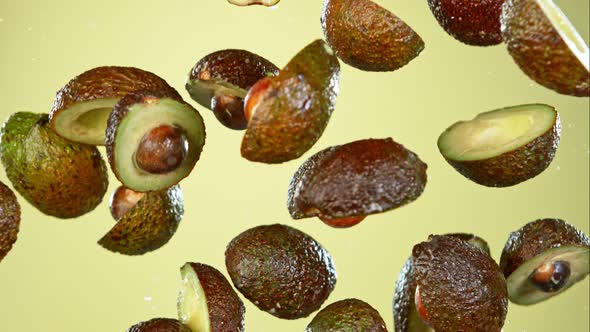 Super Slow Motion Shot of Flying Fresh Avocados at 1000 Fps alt