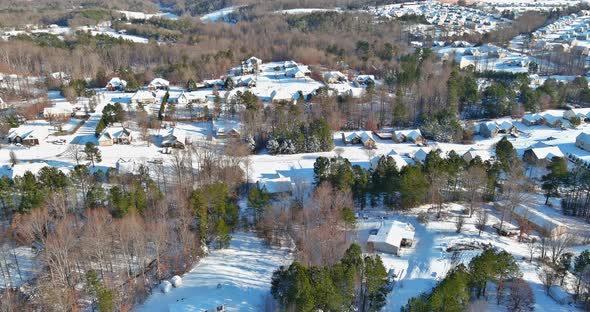 Aerial View of the Residential Districts Individual Houses in Small Town of on a Snowy Winter Day alt