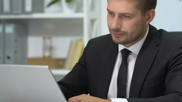 Businessman Working on Laptop Suddenly Feel Sharp Neck Pain, Sedentary Lifestyle