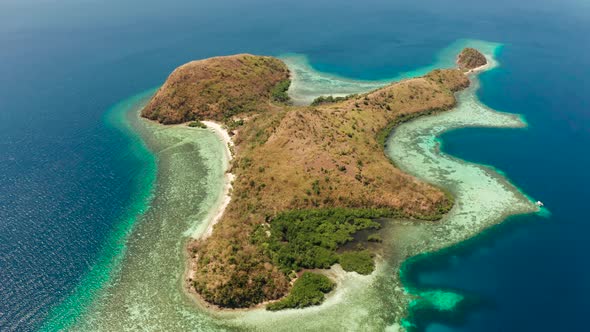 Small Tropical Island with White Sandy Beach, Top View alt