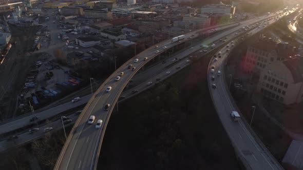 Aerial View of Elevated Highway Traffic at Sunset