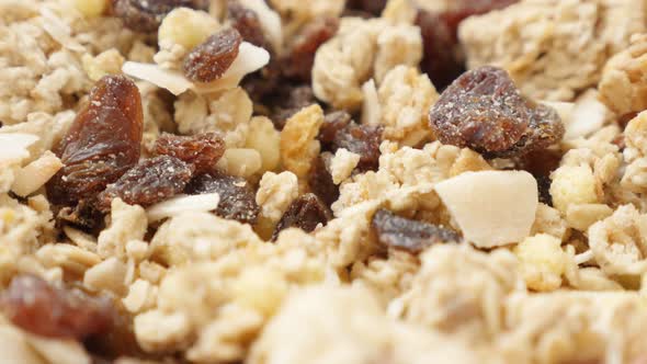 Muesli crunch in the bowl high quality balanced meal 4K 2160p 30fps UHD tilting footage - Cereals an alt