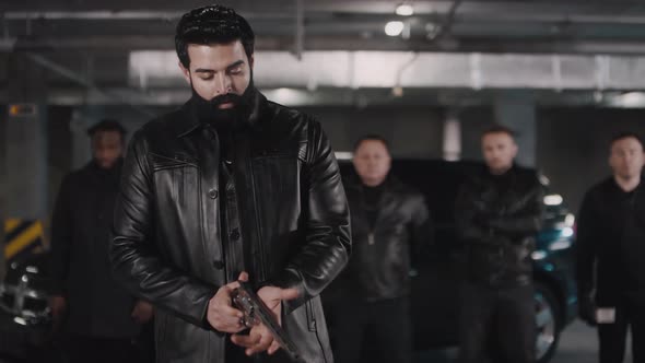 Arab Criminal Loading Gun alt