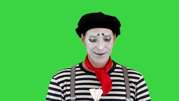 Mime Artist Holding Paper Rose Flower on a Green Screen Chroma Key alt