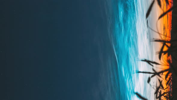 Vertical Hyperlapse Pan Slider Shot Time Lapse Night Starry Sky With Glowing Stars Above Countryside alt