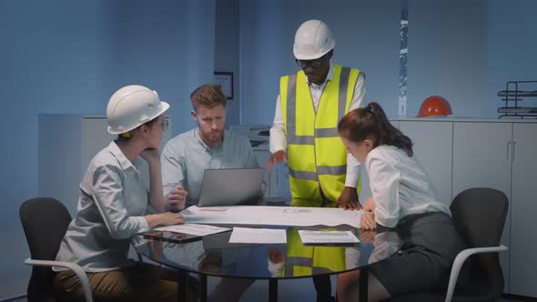 Professional Engineer Team Meeting and Working on Project at Modern Office alt