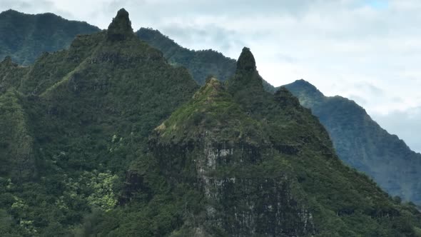 Drone Footage of Tropical Wilderness with Rainforest and Rocky Mountain Peaks alt
