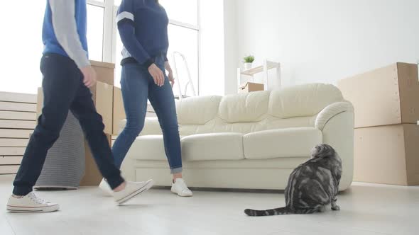 Young Mom and Son Are Moving To a New Apartment alt