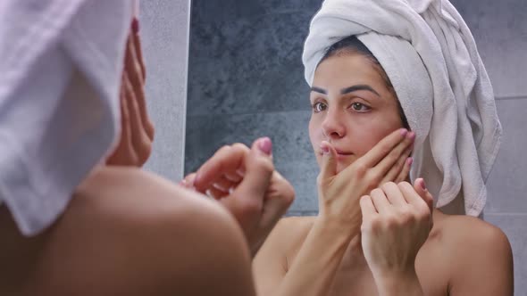 Funny Happy Attractive Woman Apply Skincare Cream on Face Look in Bathroom Mirror Healthy Young Lady