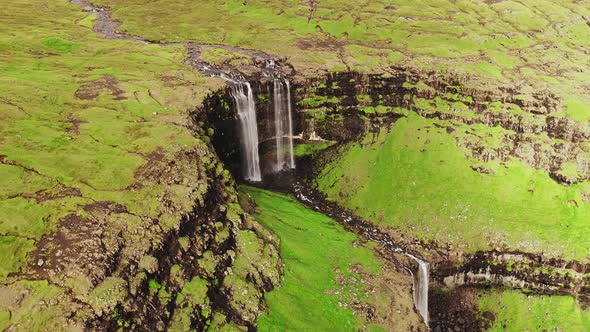 Aerial View of Stunning Waterfall in Faroe Islands. Aerial View of Fossa Waterfall. Cloudy Weather alt