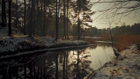 River in the Baltic dunes in Latvia in winter