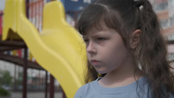 Sadness on Playground. alt