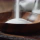 Salt Is Poured Into a Wooden Plate - VideoHive Item for Sale