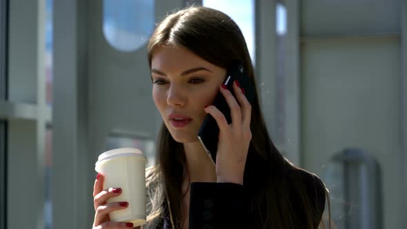 Business Woman with Coffee	