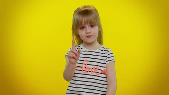 Kid Child Girl Warning with Admonishing Finger Gesture Sign Saying No Be Careful Avoid Danger alt